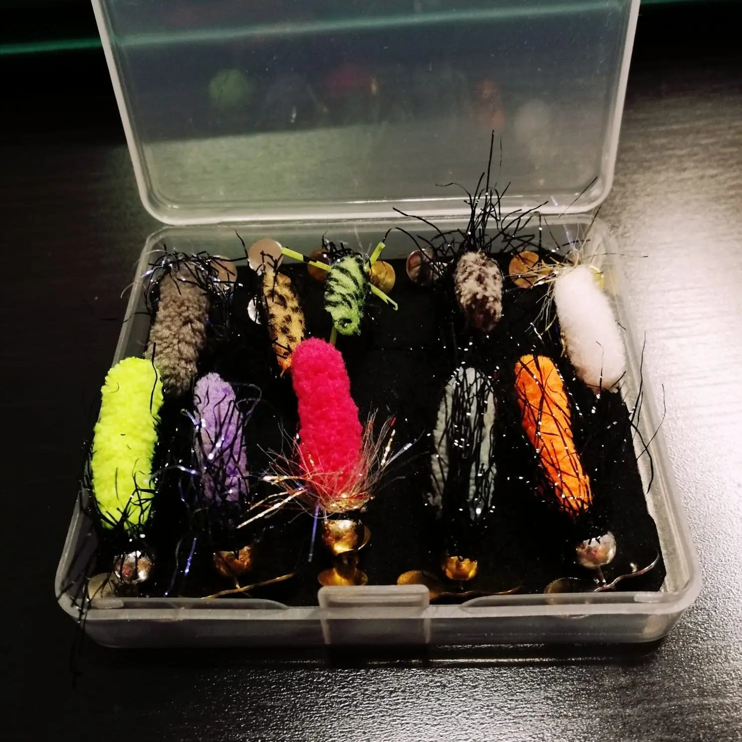 Artificiali SpinFlyStyle di diversi colori nella scatola